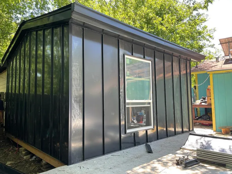 Black standing seam metal wall panels for Metal Roof Installation in Springfield